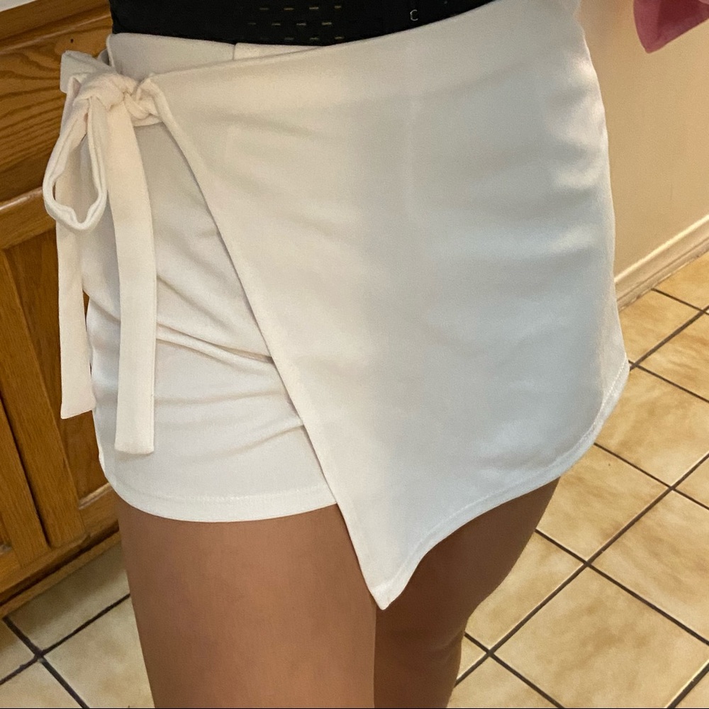 white skirt in the front shorts in the back